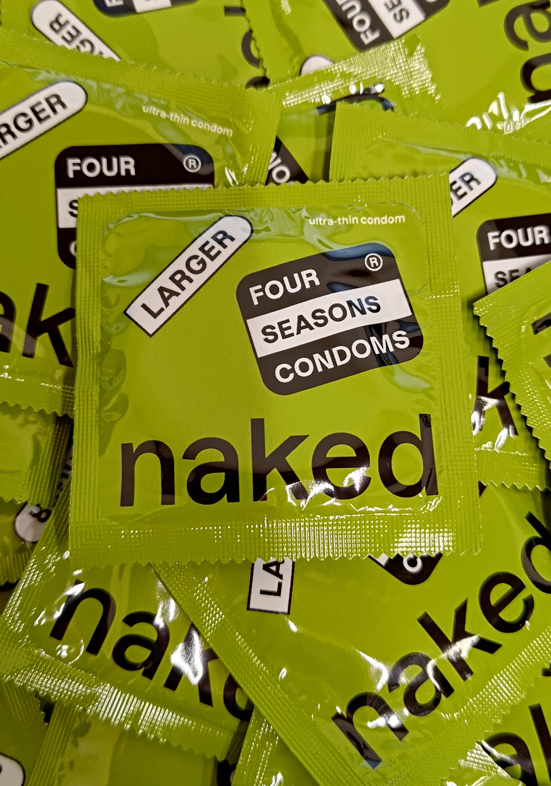 Four Seasons Naked Larger Condoms - Bulk Box of 144 - FOR6005